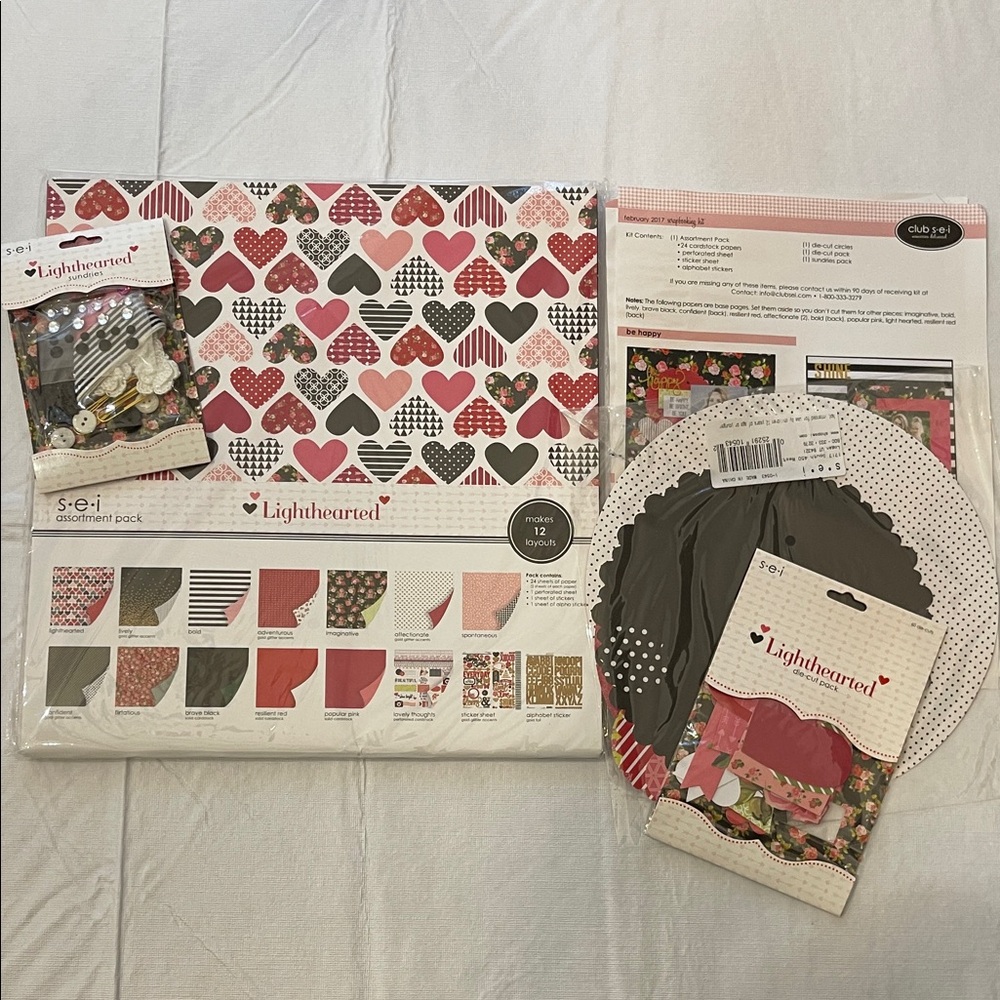 s.e.i. Lighthearted scrapbooking kit.
